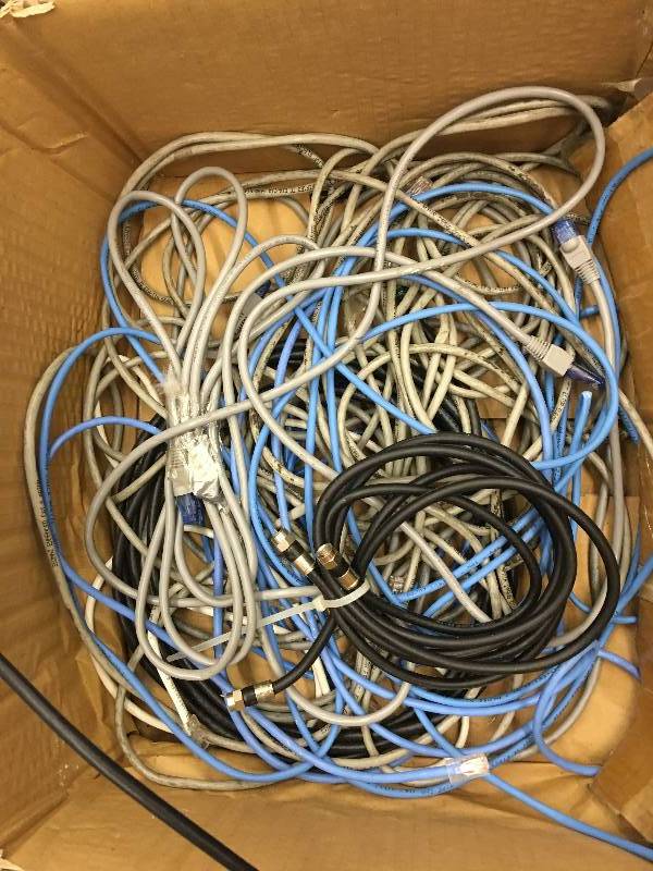 lot 610 image: large lot of cords,battery charger,humidifier