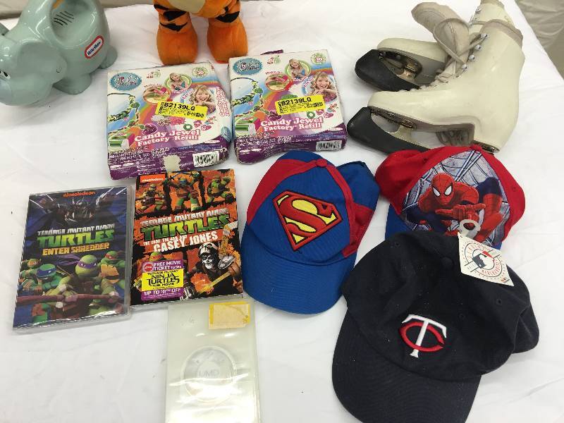 lot 619 image: ninja turtles dvds ,hats dancing tiger,flashlight