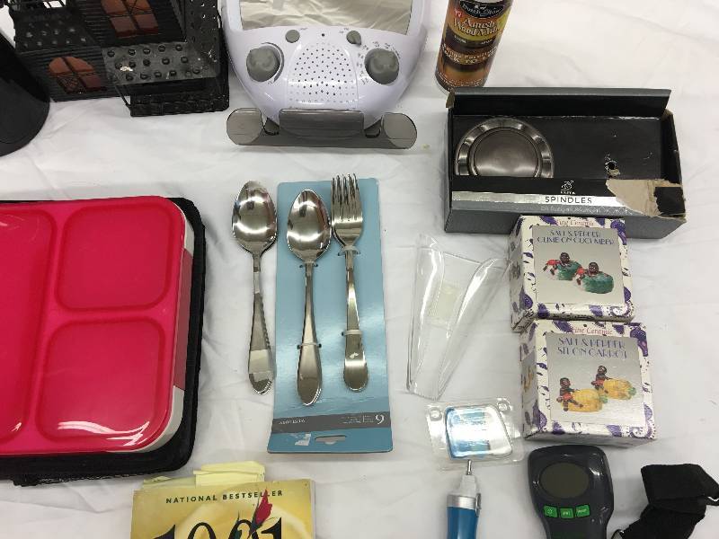 lot 641 image: shower radio with mirror,silverware,book