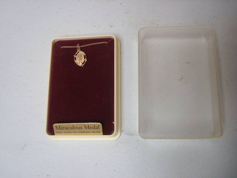 lot 45 image: Sterling Silver Religious Charm