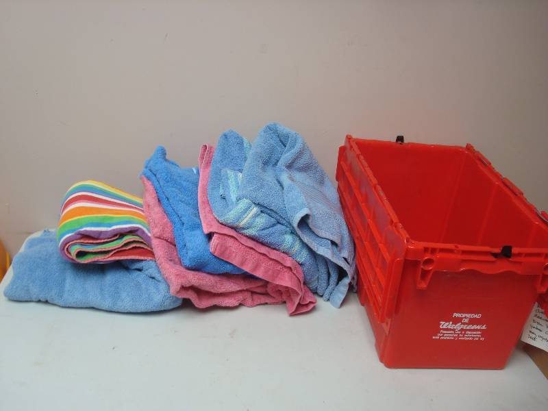 lot 60 image: Red Bin With Some Towels