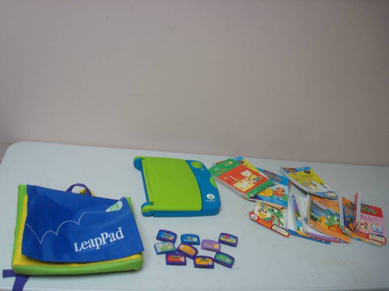 lot 76 image: Leappad And Cartridges, Untested, Shows Wear
