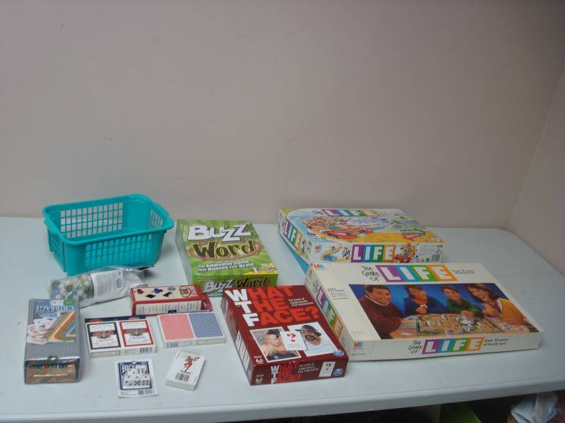 lot 92 image: Lot Of Game Items, Some New, Life Games Unchecked