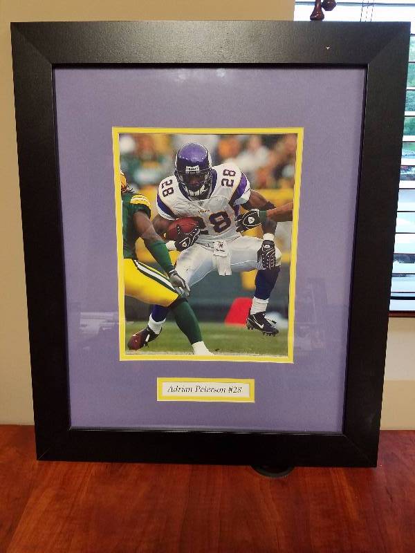 lot 16 image: Adrian Peterson #28 from Viking