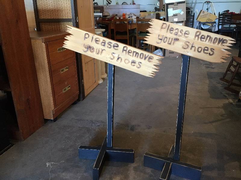 Two Remove Your Shoes Signs