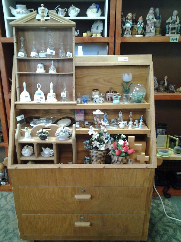 2-Drawer Rolling Cabinet Shelf Display With Contents