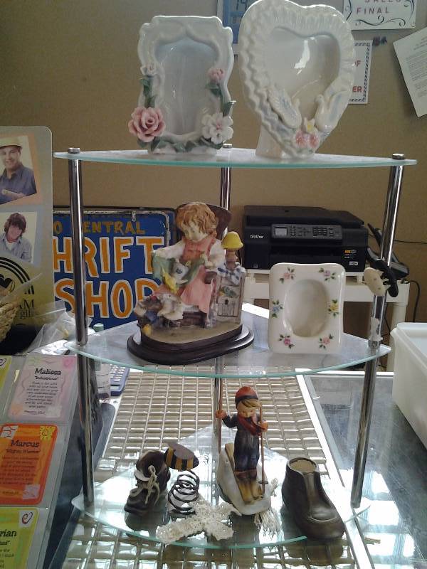 3-Level Glass Shelf With Collectibles (1-Hummel Skier)