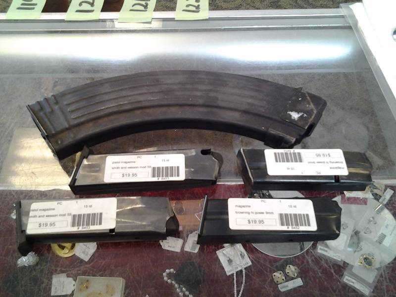 2-Smith & Wesson Mod. 59 Pistol Cartridges, 2-Browning 9mm Magazines, 1-Other