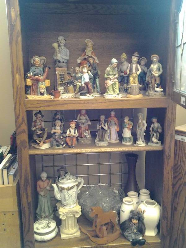 3-Shelves Of Figurines