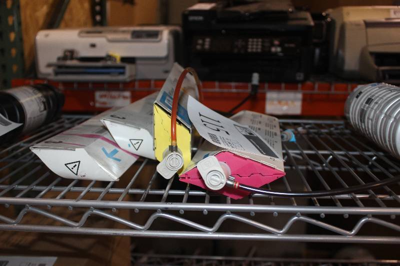 lot 115 image: Lot of (4) HP DesignJet CP Ink System Reservoir Including C1806A Black, C1807A Cyan, C1808A Magenta, C1809A Yellow
