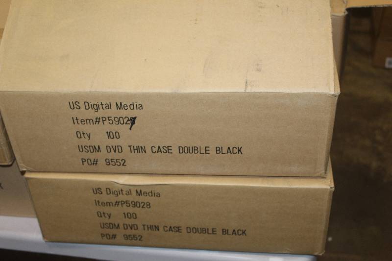 lot 92 image: Lot of (2) Boxes of US Digital Media USDM Thin DVD Case Double Disc Black