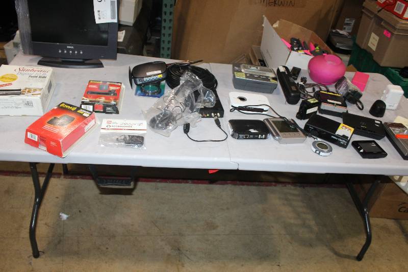 lot 96 image: 40 -Channel Emergency Radio, iHome iHM79 Dock, The Singing Machine 4tv, Viewpoint Magic Wand II Wireless, Sunbeam Digital 10 lb. Postal Scale, XM Mini Tuner Home Dock, And More