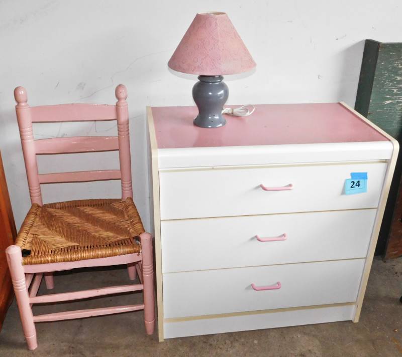 pink chair, dresser and lamp