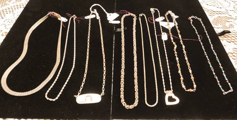 8 silvertone necklaces
