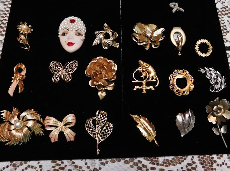 18 brooches