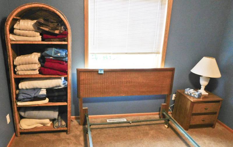 headboard, night stand, lamp and wicker cabinet