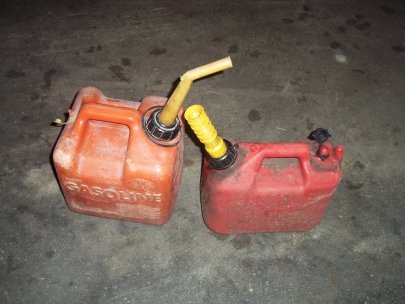 Pair of gas cans  1 gallon