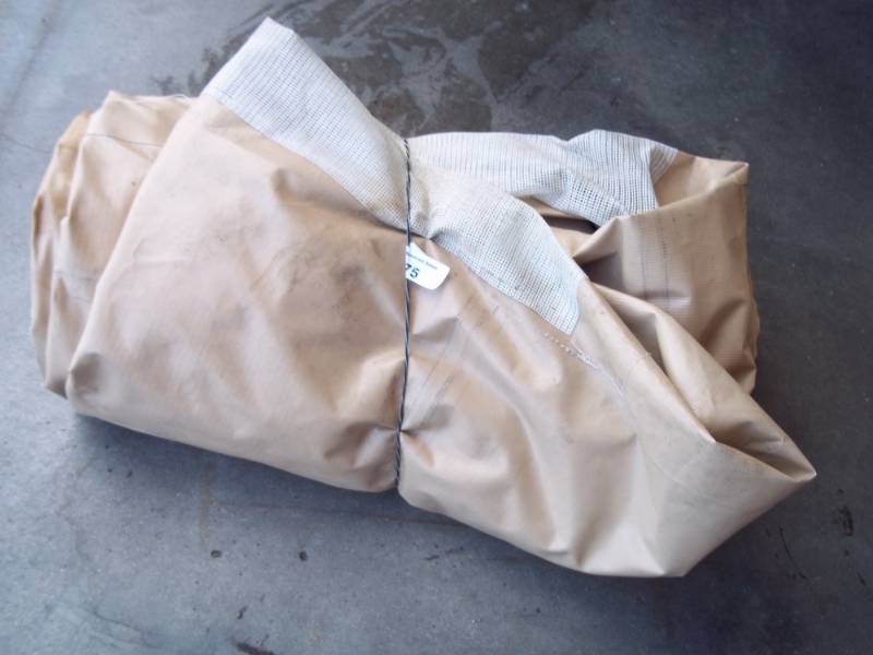 Tan tarp good for woodpile