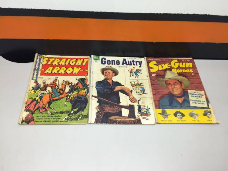 lot 29 image: WOMENS GLOVES (20 prs) NEW AND OLD COMIC BOOKS, OLD WESTERN COMICS, VINTAGE WOODEN STOOL,  PLASTIC CONTAINER WITH EAR PLUGS