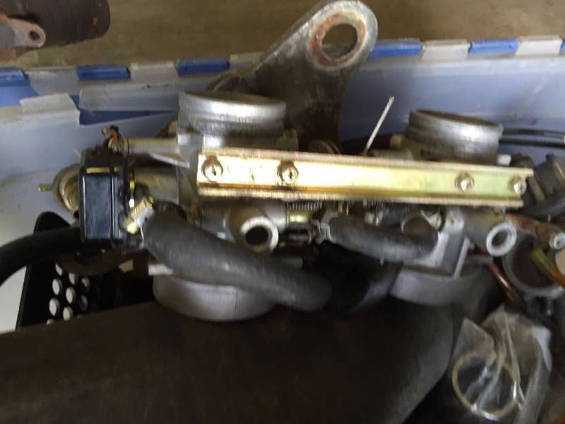 lot 45 image: ARTIC CAT SNOWMOBILE ENGINE, MUFFLERS, CARBS, ASSORTED PARTS