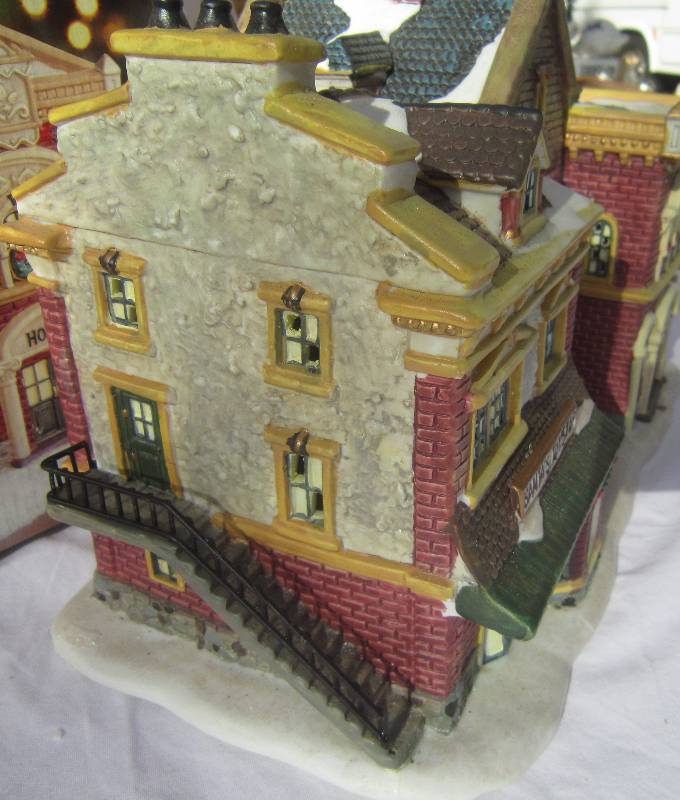 lot 553 image: Collectible Christmas Lighted House with Box - Village Square - Main Street