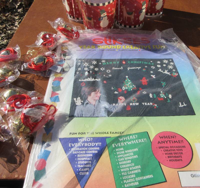 lot 518 image: Christmas Lot - Window Stickers, 6 Glasses and 8 Jingle Bell Necklaces