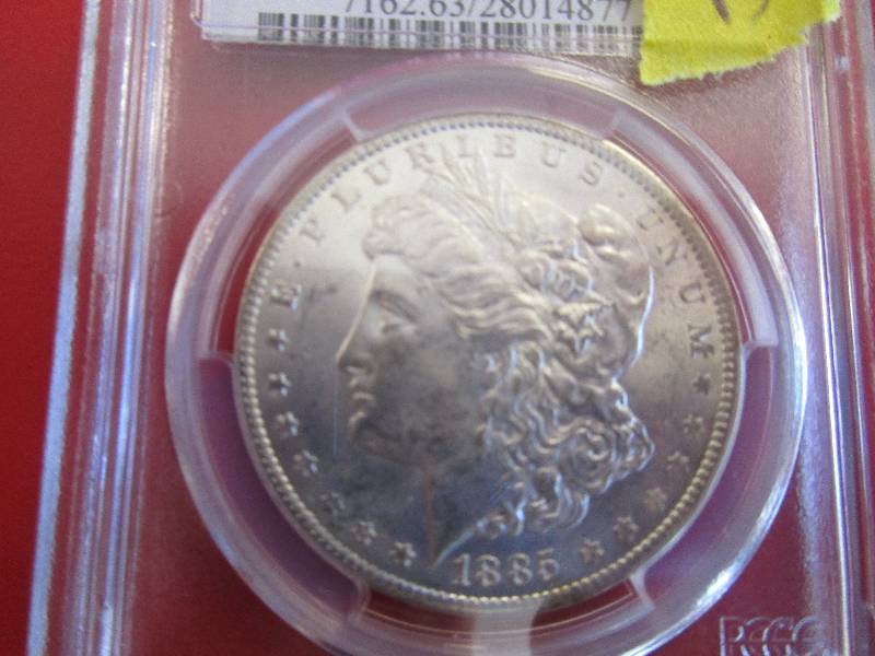 13. PCGS Certified 1885-0 Morgan Silver Dollar in Mint State MS63 Condition. Nice Coin.