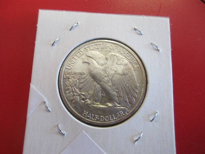 15. 1944-D Walking Liberty Half Dollar in AUBU Condition