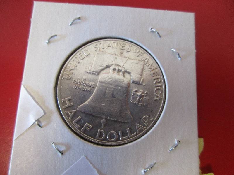 20. 1959-D Franklin Half Dollar in AUBU condition
