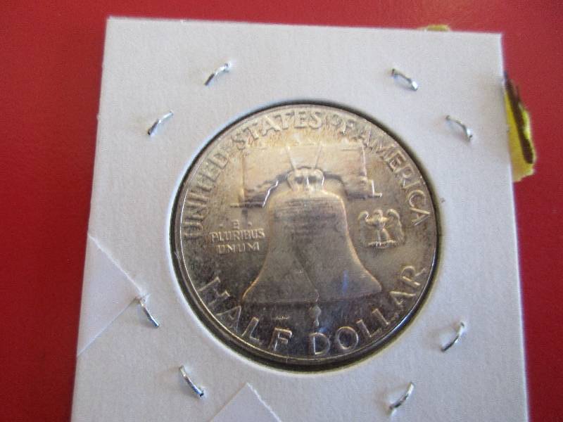 1955-P Franklin Half Dollar in BU condition. Brilliant mint luster