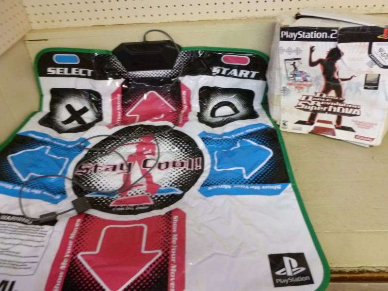 lot 302 image: Playstation 2 Dance Revolution