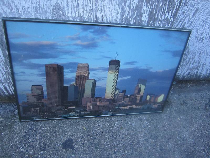 Framed city scene 28 x 18...