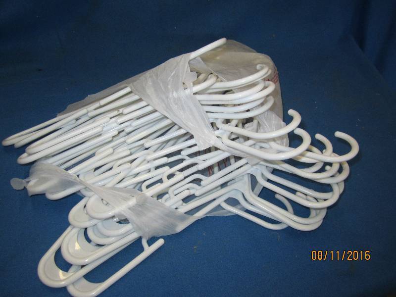 Lot of white plastic hangers ...