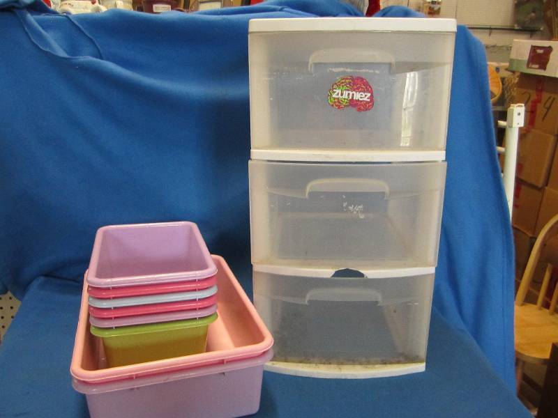 Lot of small organizing bins and st...