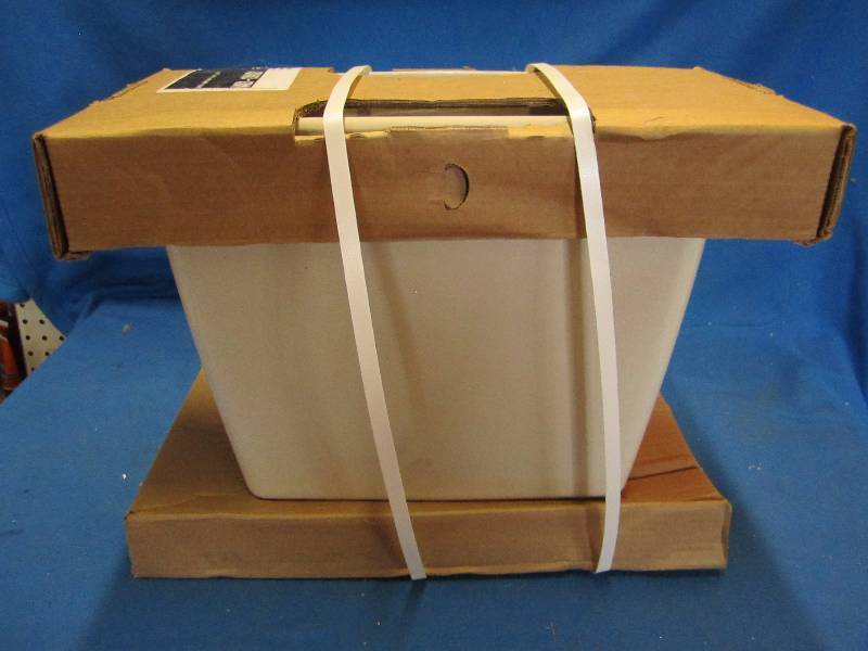 toilet tank with complete flush sys...