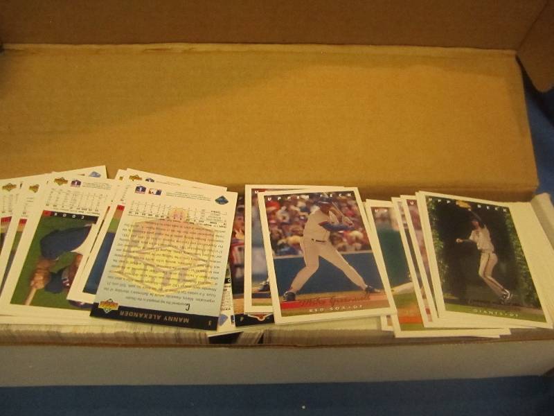 box of sport cards baseball...