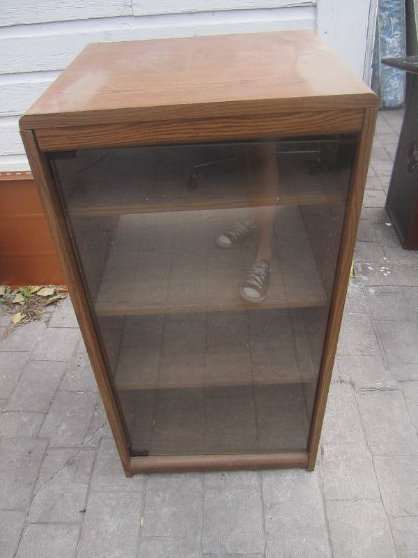 Wood cabnit with glass door 18x18x4...