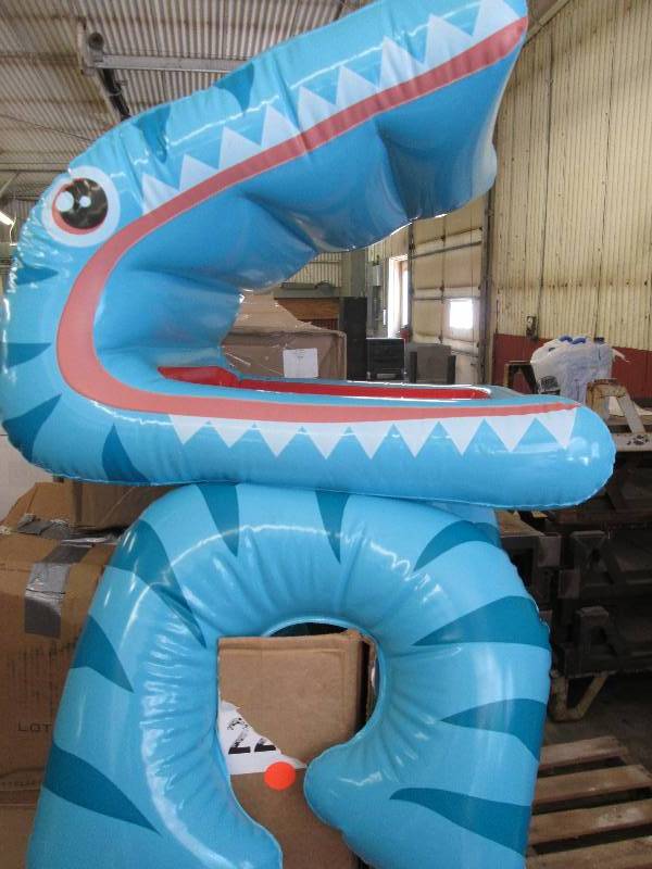 lot 18 image: Pool Inflatable Toy blue in color...