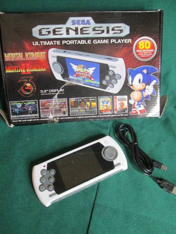 lot 33 image: Sega Genesis Portable Game Player w...
