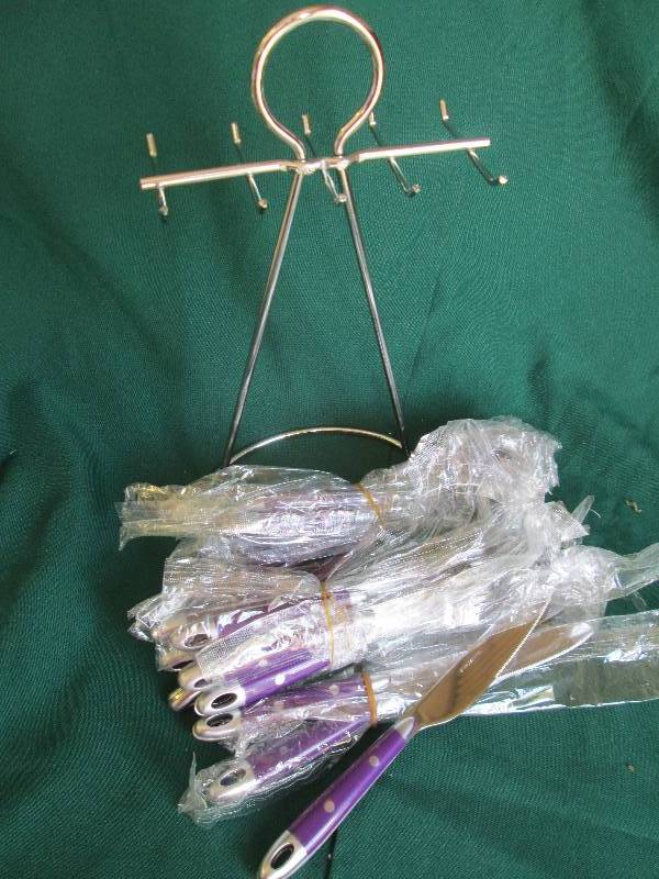 lot 35 image: Silver ware set with silver stand  ...