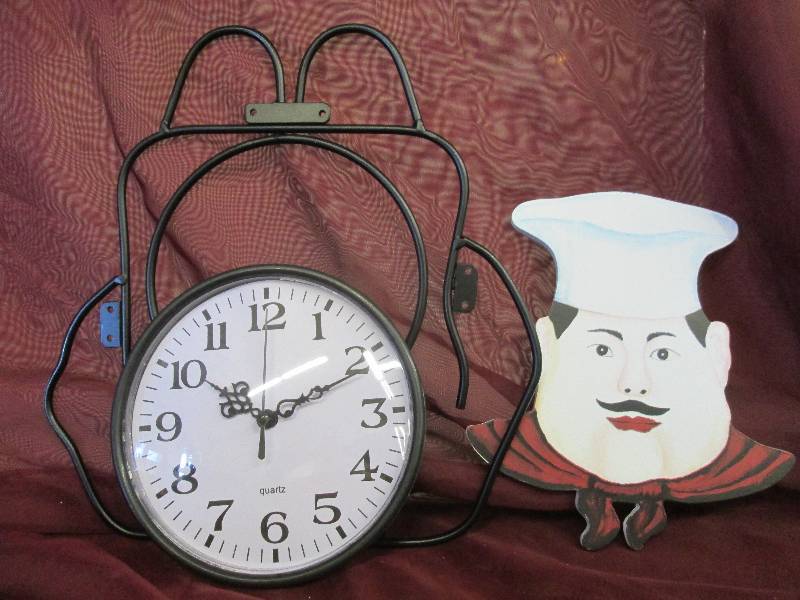 lot 103 image: Decortive clock with chief man...