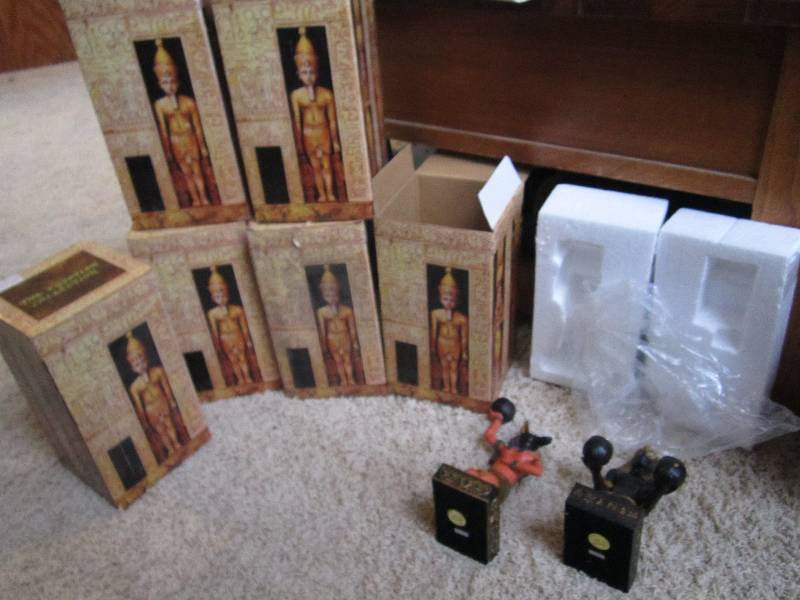 Lot of 7 Egyptian figures, 6 orange...