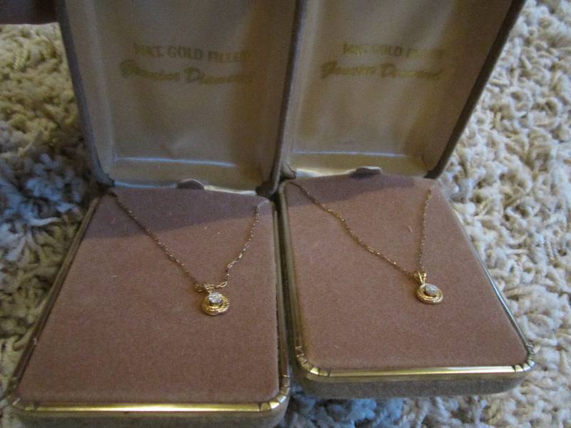 Lot of 2 genuine diamond 14 kt gold...
