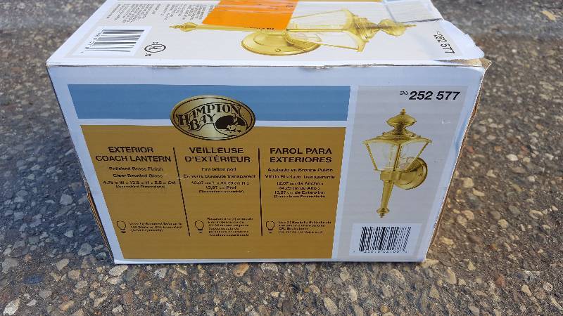 lot 13 image: Hampton Bay Wall Mounted 1-Light Outdoor Polished Brass Wall Lantern WB0322 New