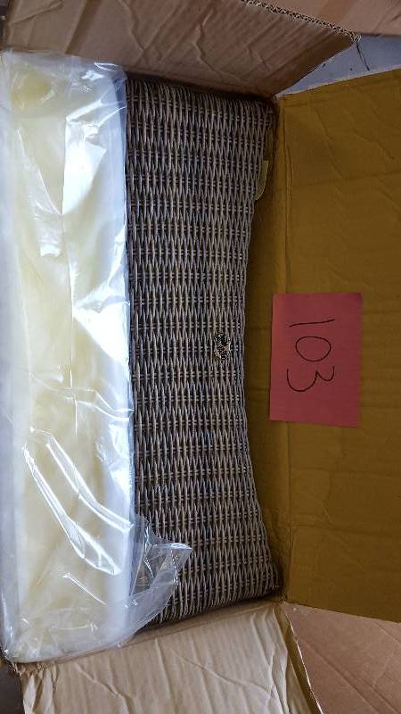 lot 103 image: Spring Haven Grey Wicker Patio Ottoman with Cushion Insert (Slipcovers Sold Separately) New