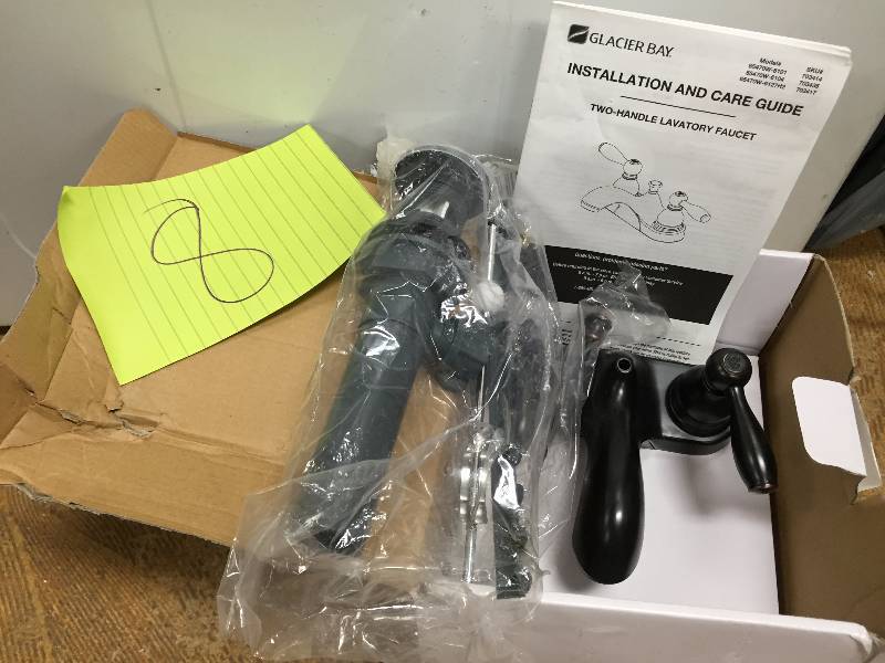 lot 8 image: Glacier Bay Mandouri 4 In. Centerset 2-handle Low Arc Bathroom Faucet In Bronze New
