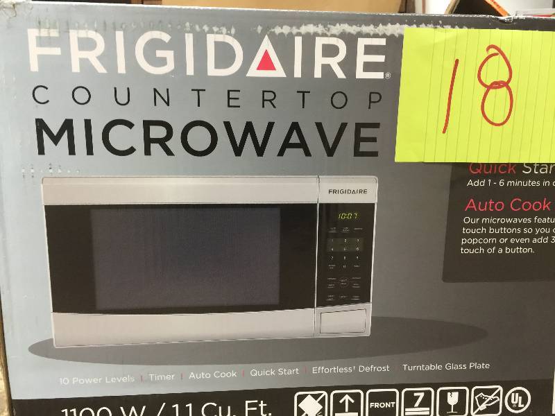 lot 18 image: Frigidaire 1.1 cu. ft. Countertop Microwave in Stainless Steel Model # FFCM1134LS  New