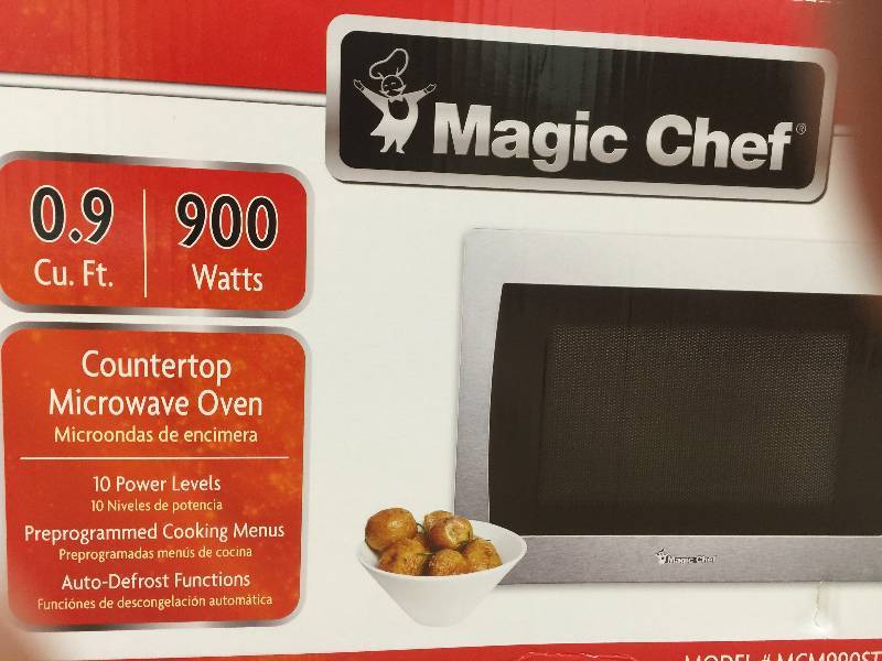 lot 29 image: Magic Chef 0.9 cu. ft. Countertop Microwave in Stainless Steel New