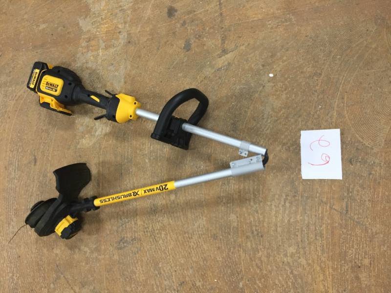 lot 62 image: DEWALT DCST920P1 20V MAX 5.0 Ah Lithium Ion XR Brushless String Trimmer in like New working conditions