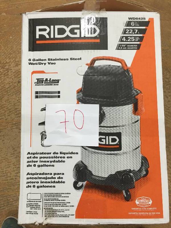lot 70 image: Ridgid 6 Gal. 4.25-Peak HP Stainless Steel Wet Dry Vac in like new conditions